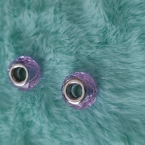 Two purple charms